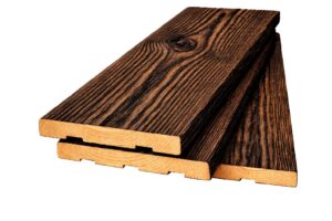 Förkolnad och borstad fasadpanel av nordisk gran